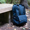 PKG_Rosseau_Navy_backpack_outdoor_countryside.jpg