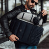 STM_DUX_30L_backpack_black_night_side_access_opening_27dcfac0-d905-42d7-9f6e-11c261c55a5c.jpg