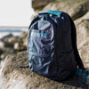 stmgoods-stories-trilogy-backpack-blue-on_shoulder.jpg
