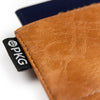 PKG-Perry-RFID-passport-wallet-Tan-logo.jpg