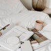 Vonmaehlen_Aura_wireless_chargind_pad_lifestyle_reading.jpg